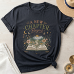 A New Chapter Begins-Still Becoming T-Shirt