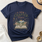 A New Chapter Begins-Still Becoming T-Shirt